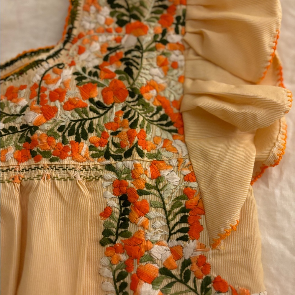 Beautiful embroidery on a butterfly sleeve blouse